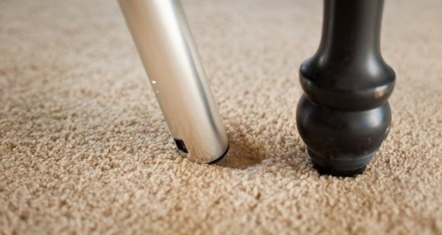 Use Your Vacuum to Correct Furniture Dents on Carpets