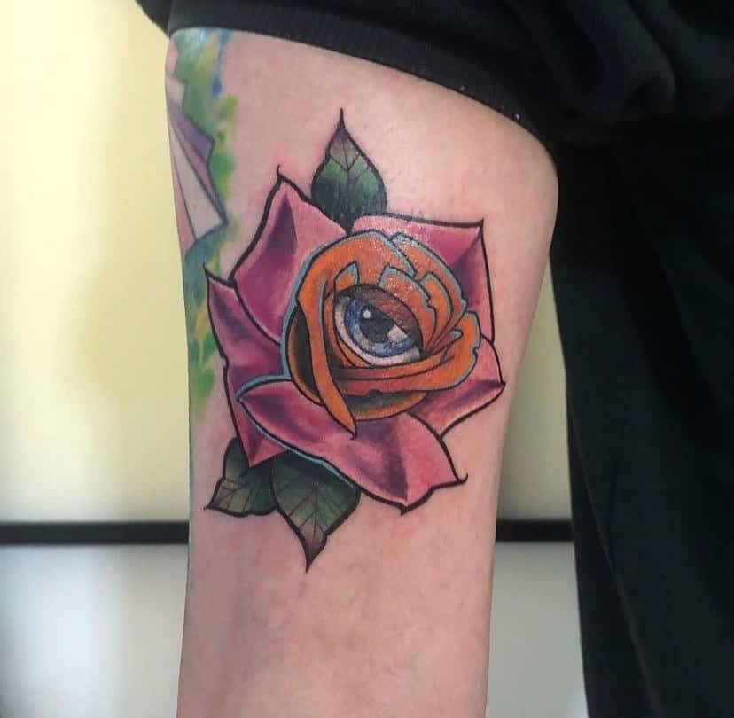 4] Utmost Realistic Big Eyeball Tattoo Design With Rose On Hand