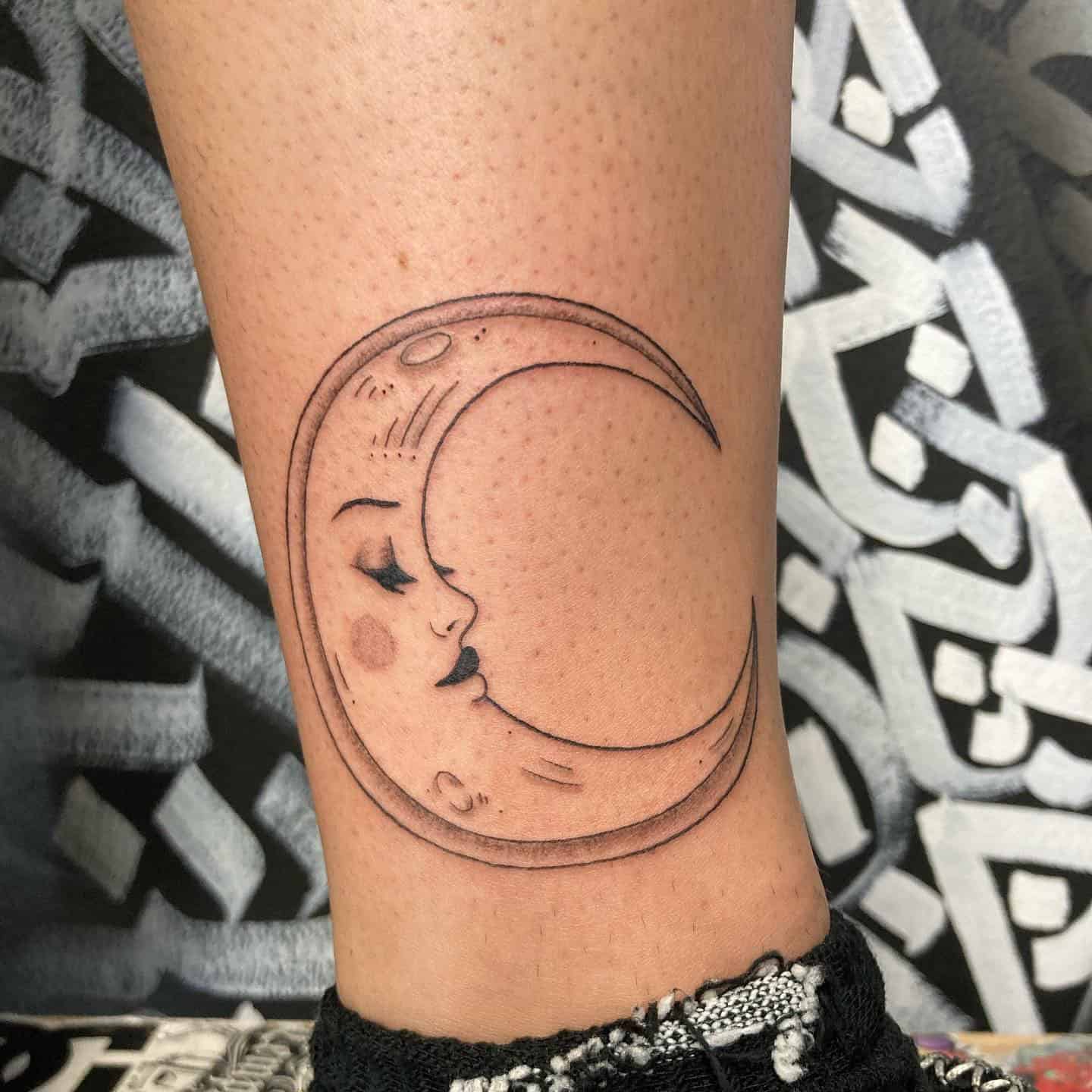 12] Custom Crescent Moon Leg Tattoo: Celestial Waters