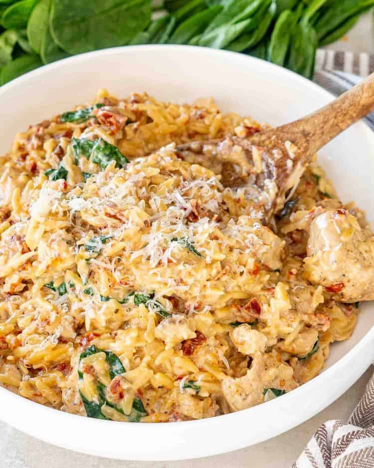 SLOW COOKER CREAMY TUSCAN CHICKEN ORZO