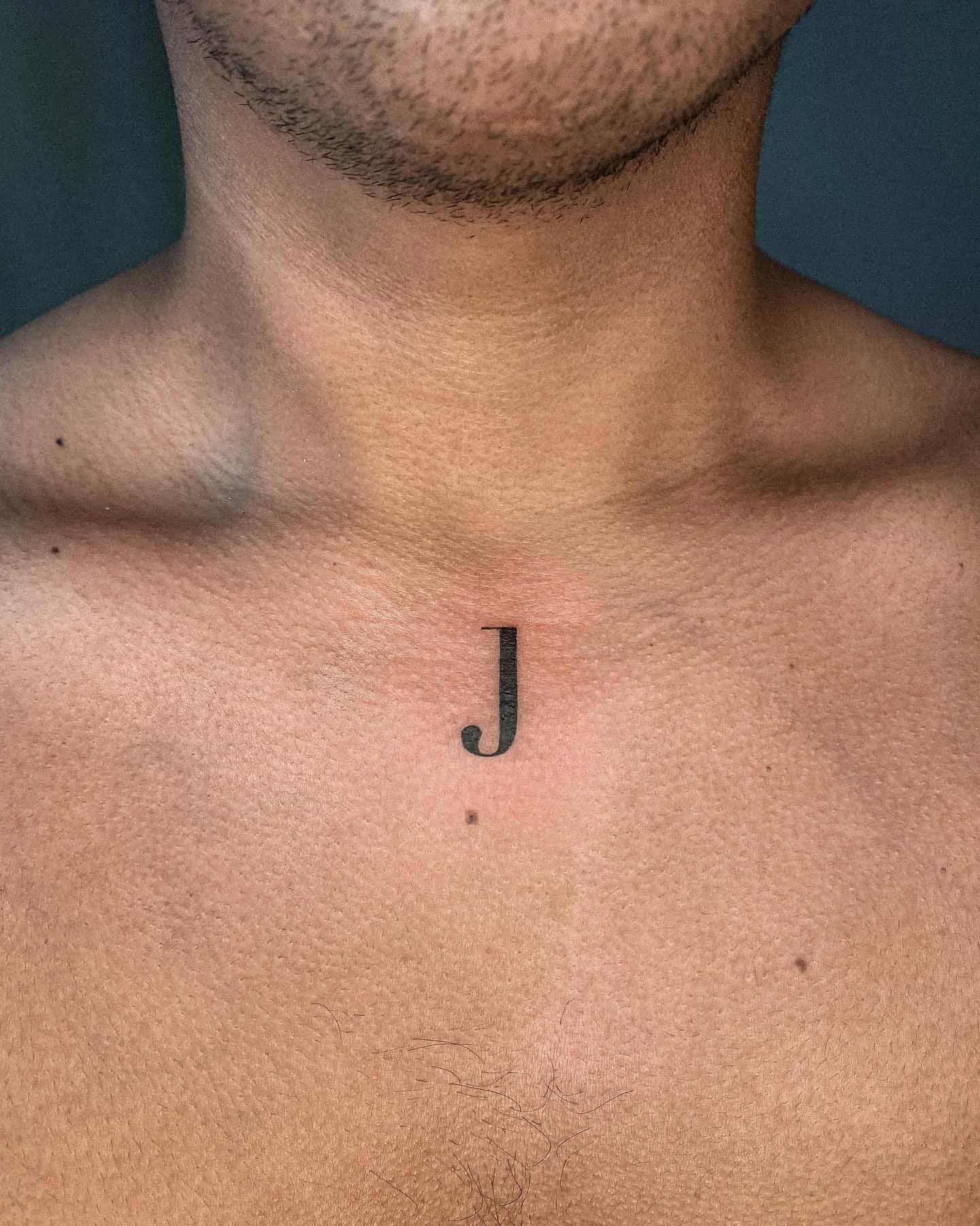 45] Letter ‘J’ Tattoo: Bold Centerpiece