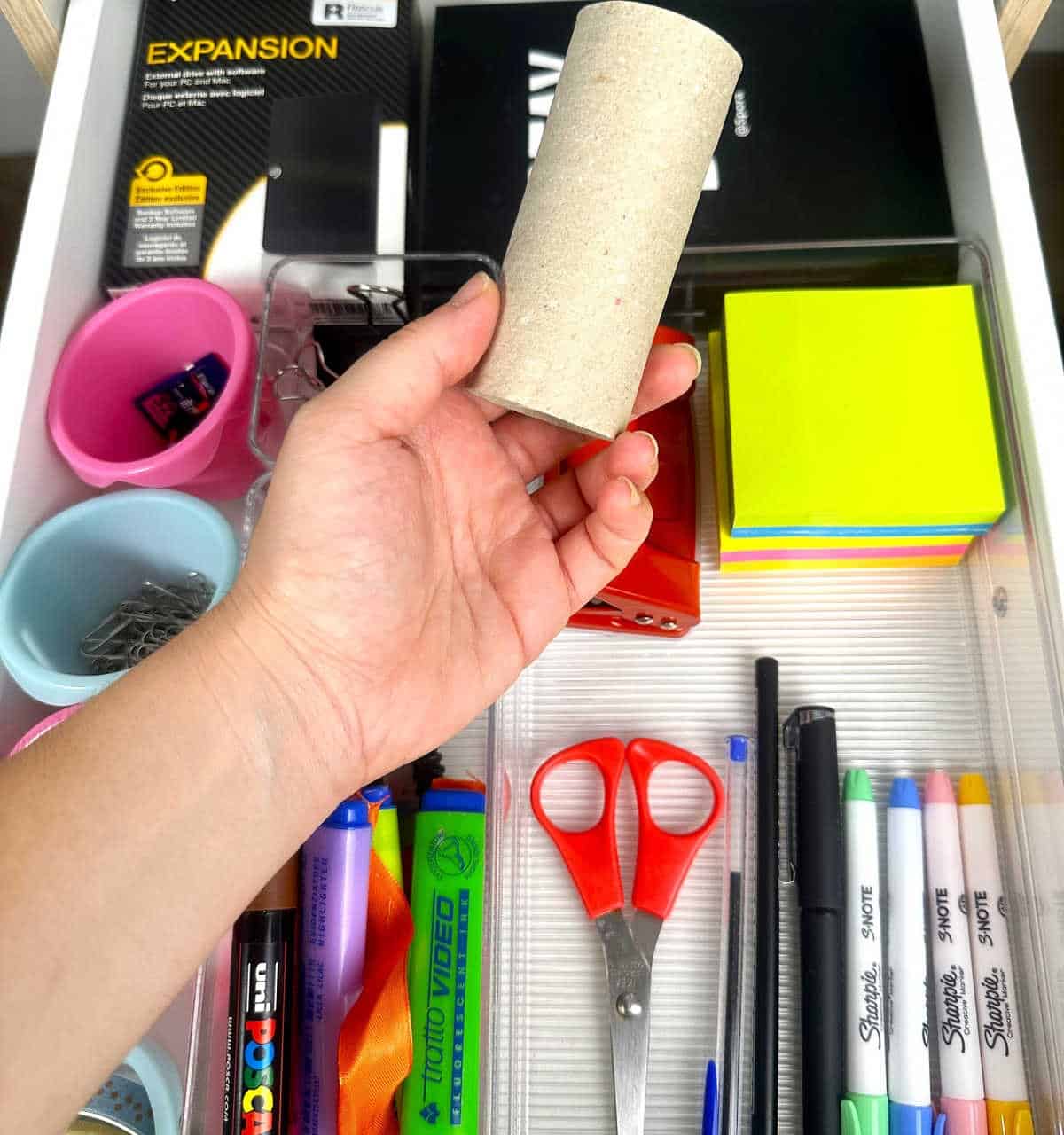 Use a Toilet Paper Roll to Keep Stationary in Place