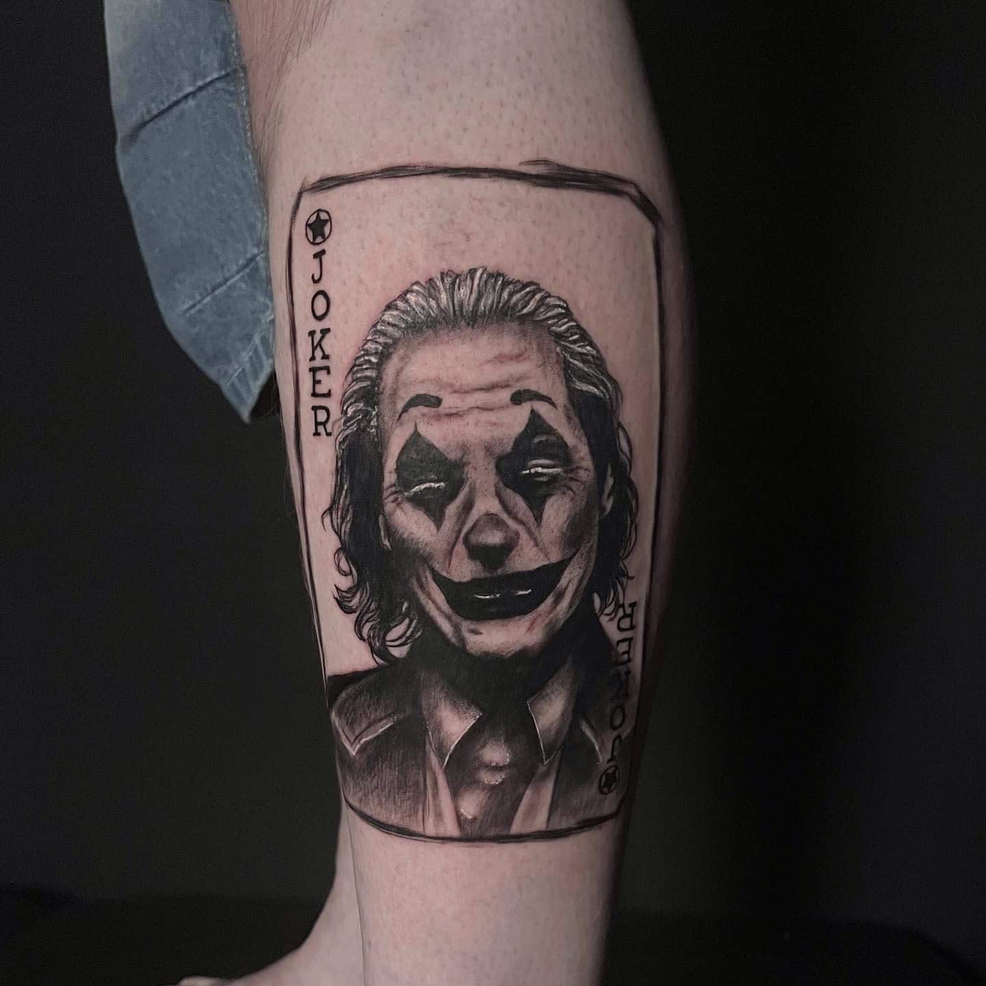 19] Joker Face Tattoo on Leg Side Male: Daring and Expressive Tattoo Design