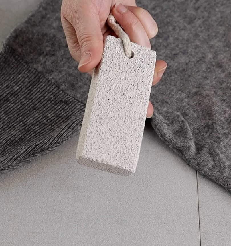 Use A Pumice Stone To De-Fuzz A Sweater