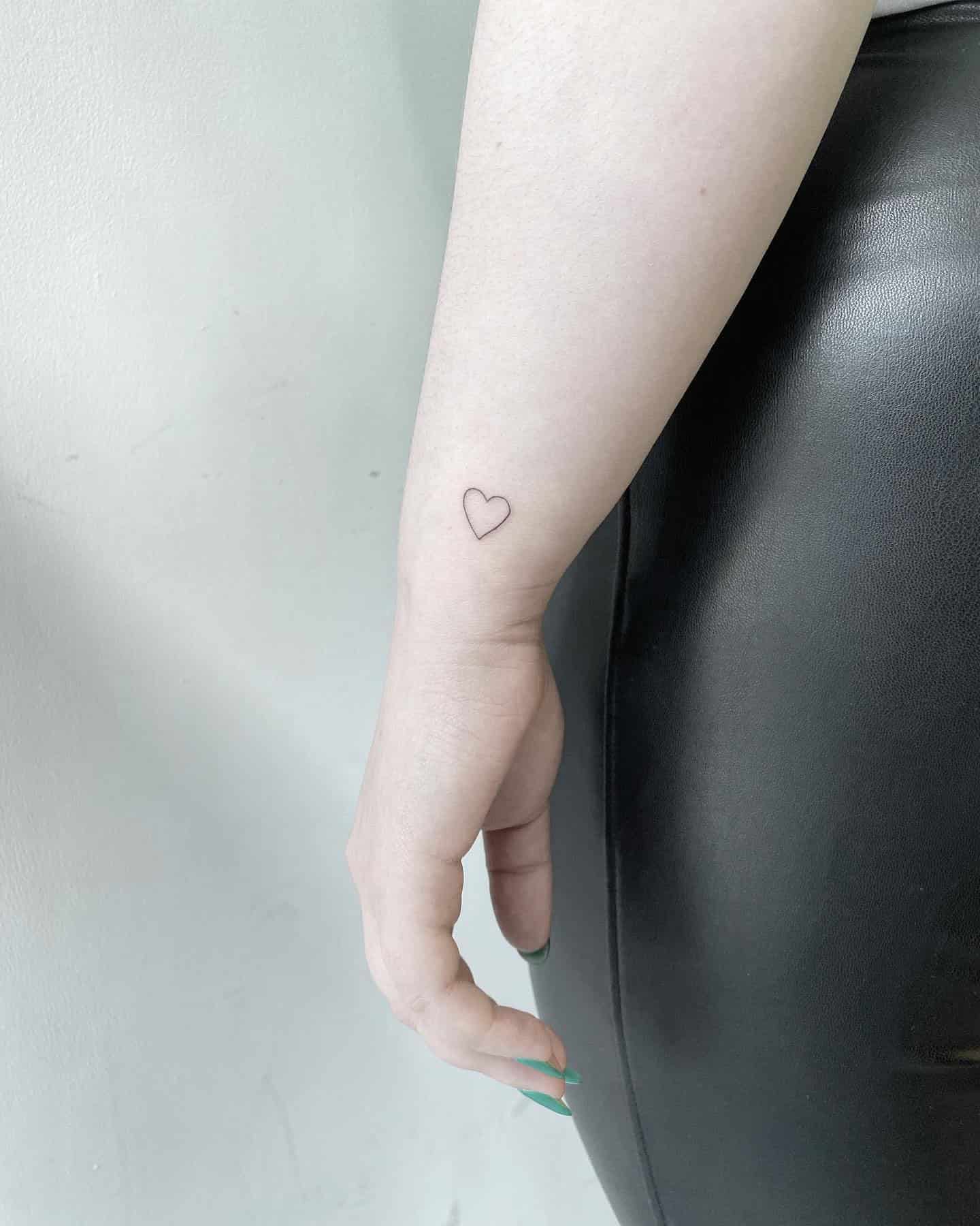 23] Small Heart Tattoo on Side of Wrist: Dainty and Delicate