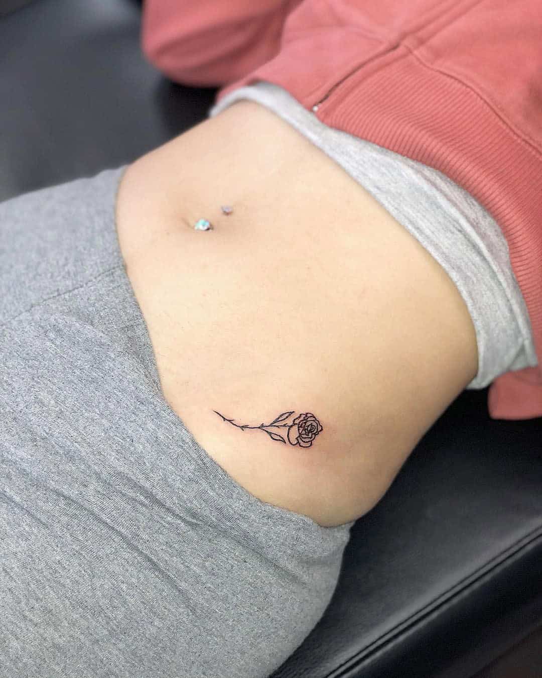 34] Little Rose Hip Tattoo: Dainty Bloom