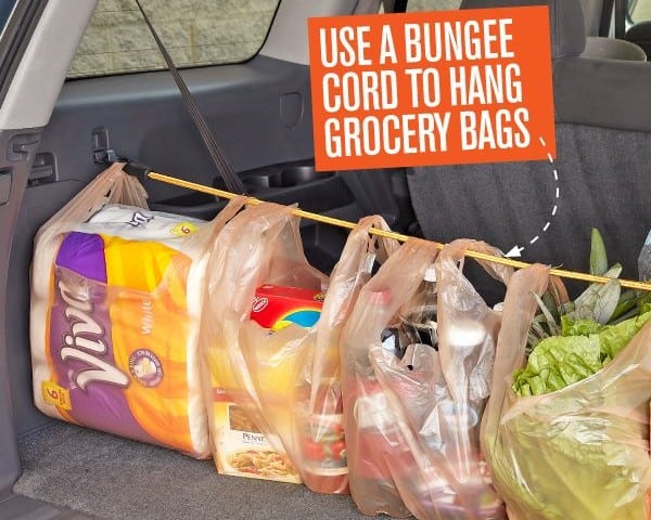 Use a Bungee Cord to hang Grocery Bags