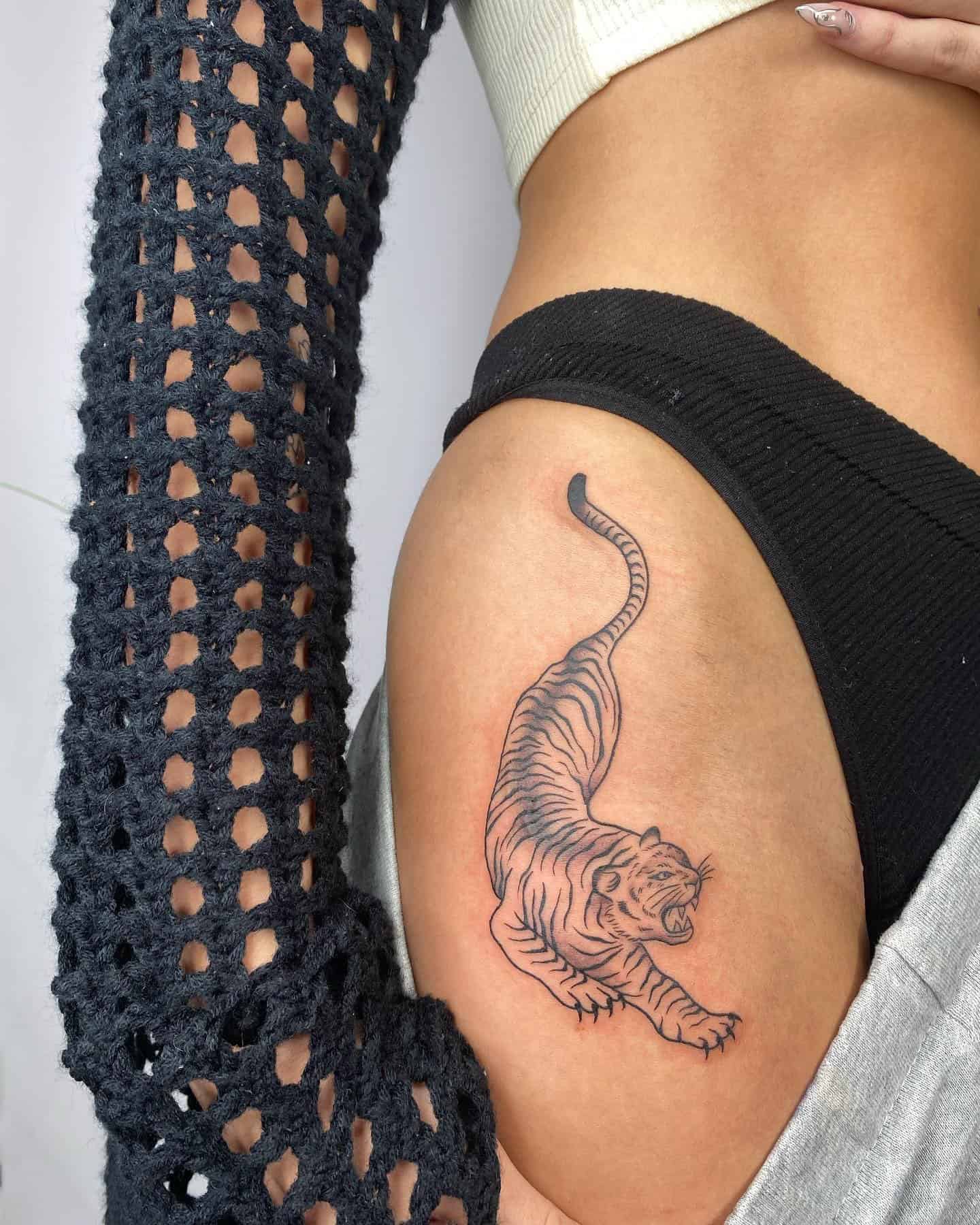 61] Tiger Hip Tattoo for Females: Feline Grace