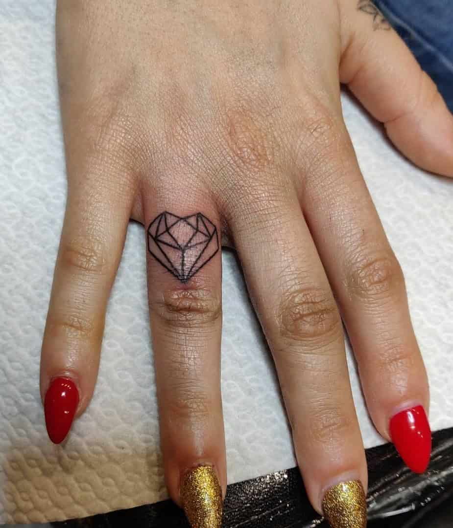 17] Geometric Love Heart Tattoo on the Ring Finger