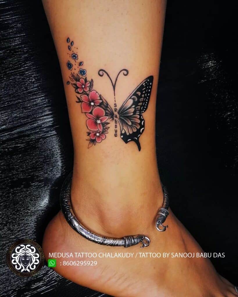 9] Dispersing Flower Butterfly Tattoo Design For Women’s Leg