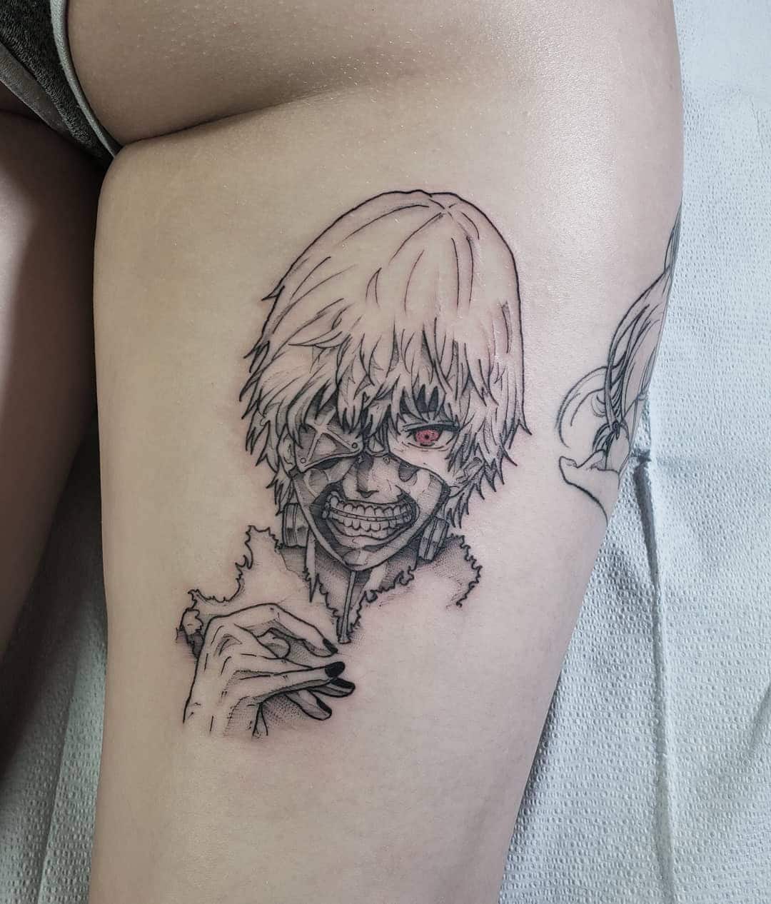 20] Tokyo Ghoul Anime-Inspired Art: Thigh Tattoo Elegance