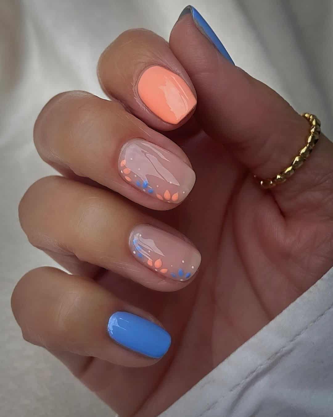 CORAL AND BLUE NAILS