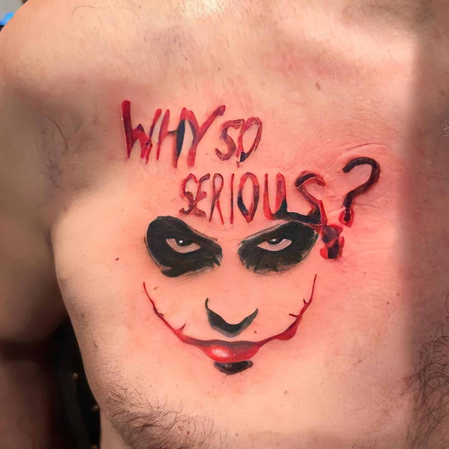 13] “Why So Serious” Joker-Face Tattoo Designs in Red Color Text on Chest