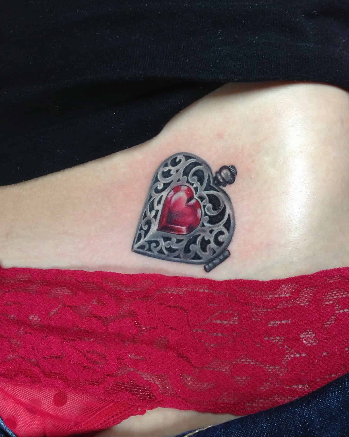 22] Heart Locket Hip Tattoo: Symbolic Love