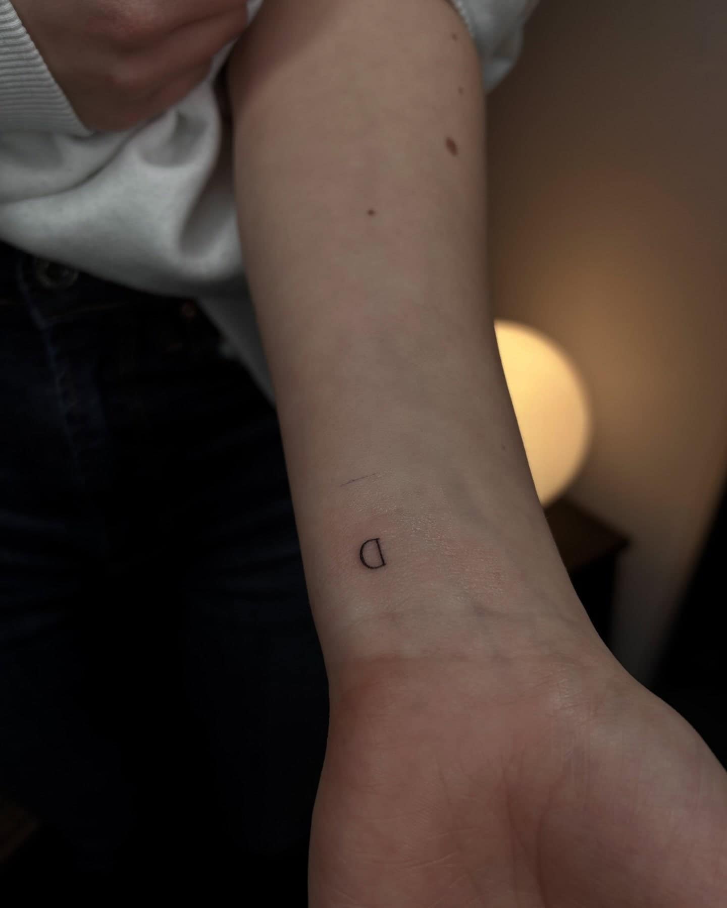 20] Small ‘D’ Letter Tattoo: Feminine Touch