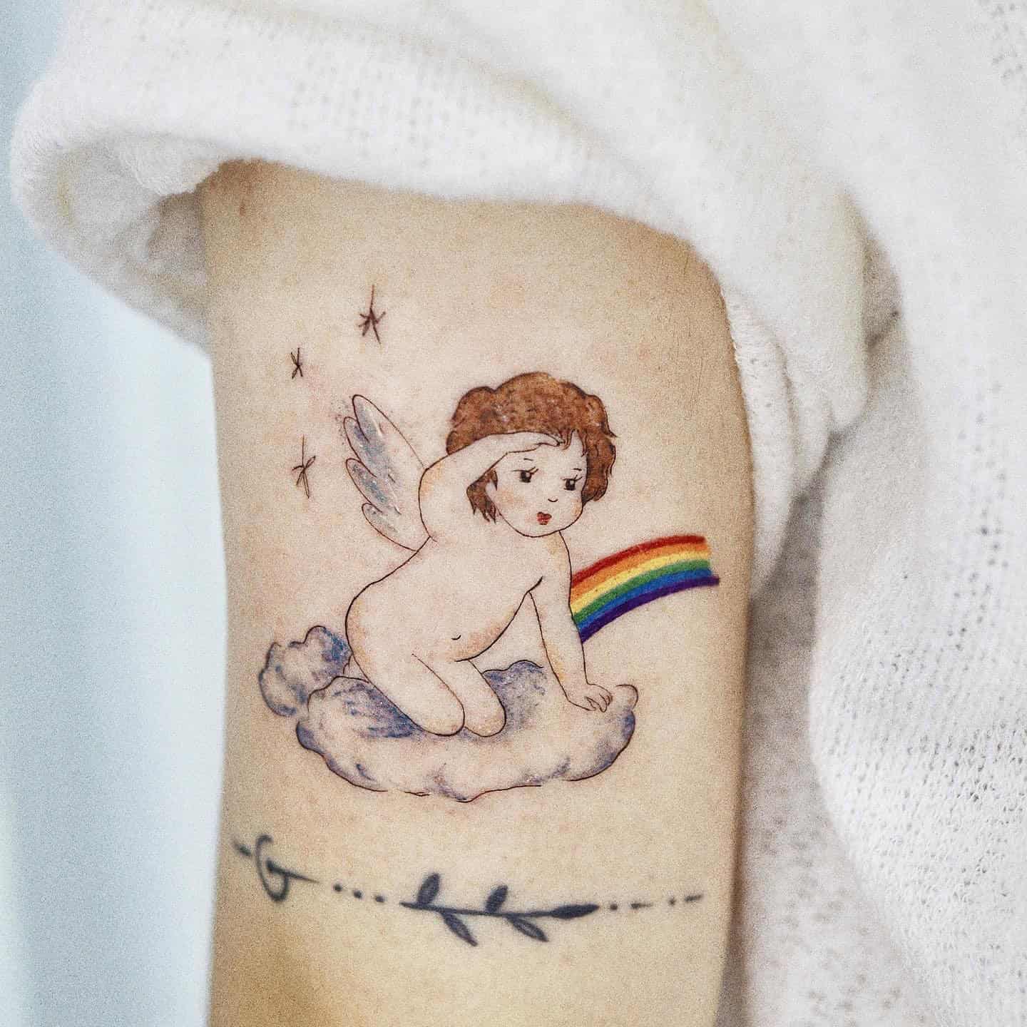 12] Baby Angel Hand Tattoos: Above the Clouds