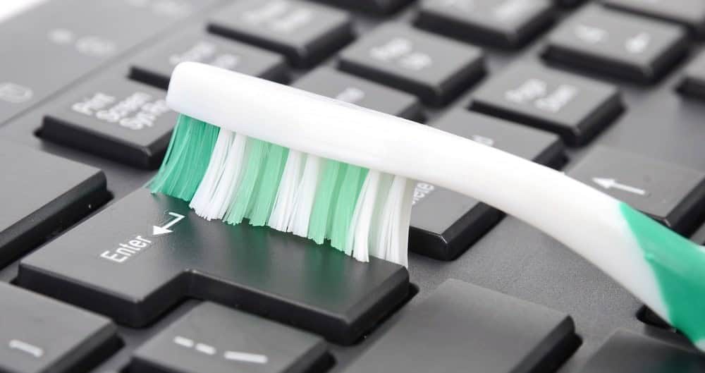 Clean Your Keyboard with a Toothbrush