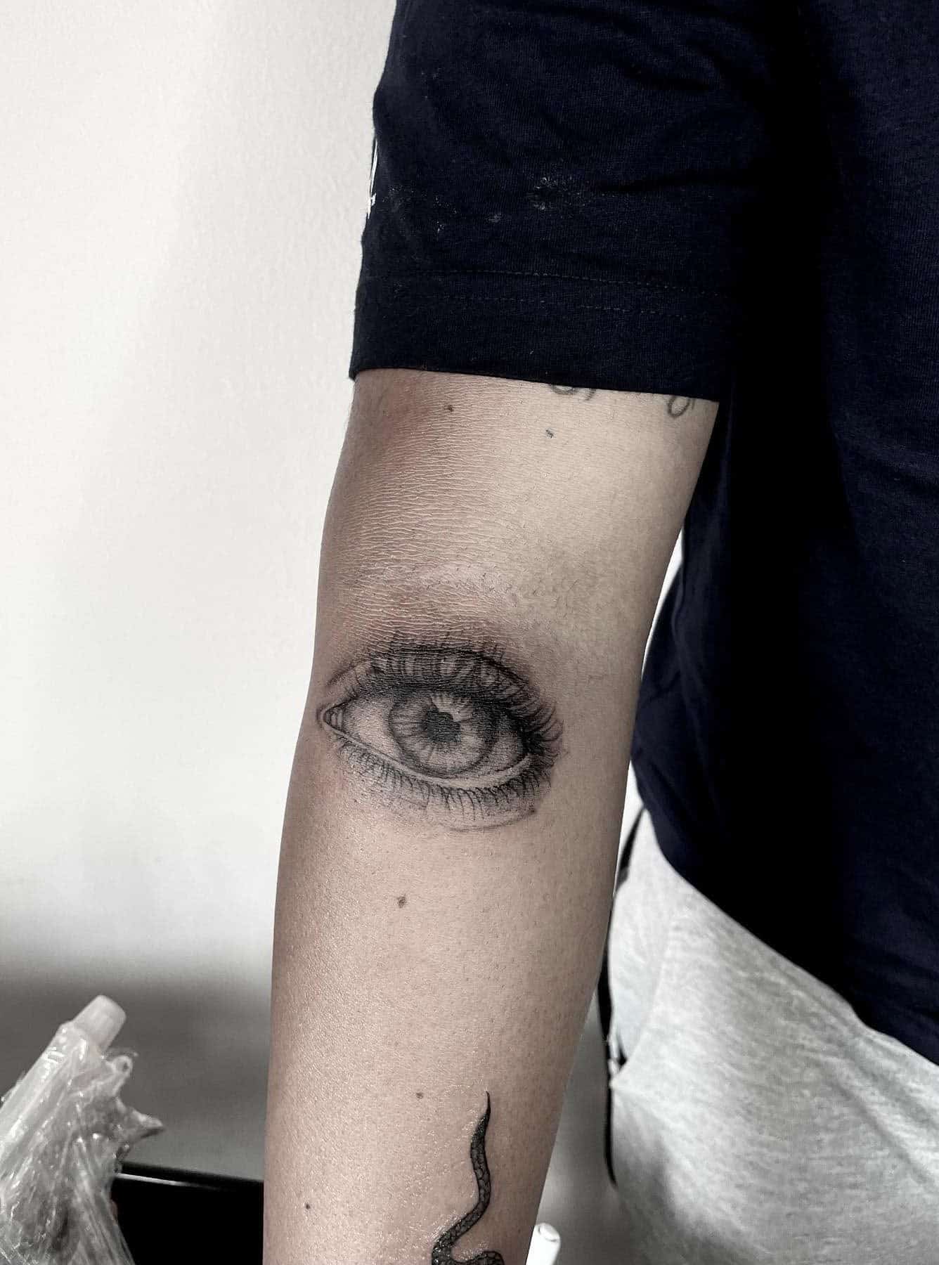 32] Big Black/Grey Eye on Inner Elbow: Intricate Insight