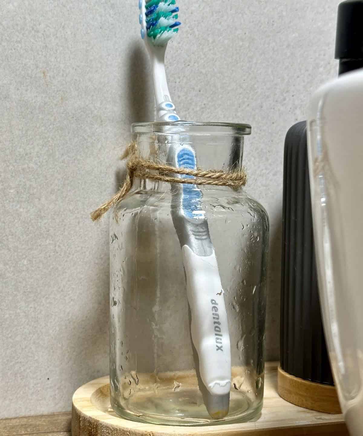 Use A Glass Jar As A Toothbrush Holder