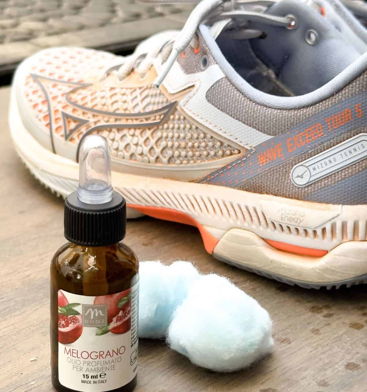 Place Cotton Balls with Essential Oil into Your Smelly Shoes