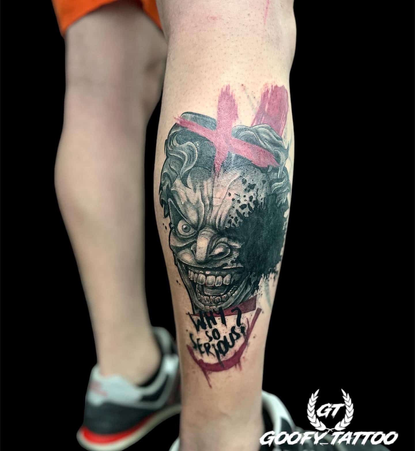 21] Leg Back Tattoo Joker Design: Angry Face and “Why So Serious” Text – Captivating Tattoo Idea