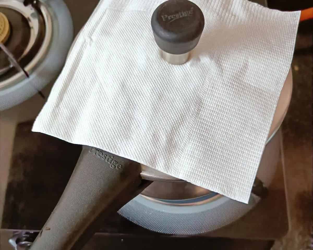 Tissue Paper to Avoid Mess from cooker