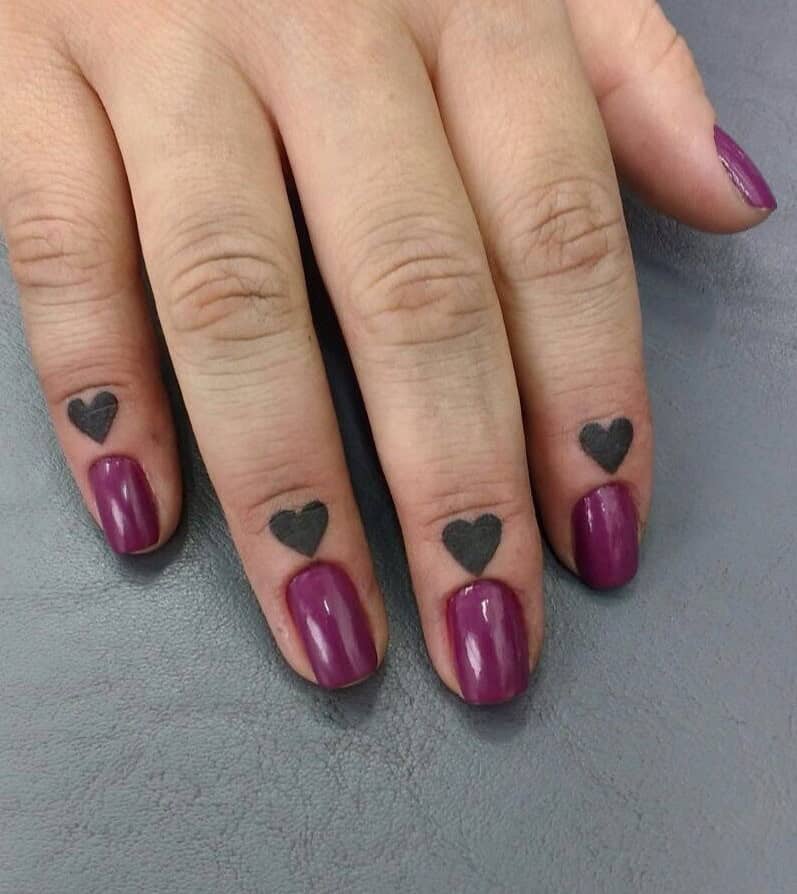 15] Four Finger Love Heart Tattoo Designs