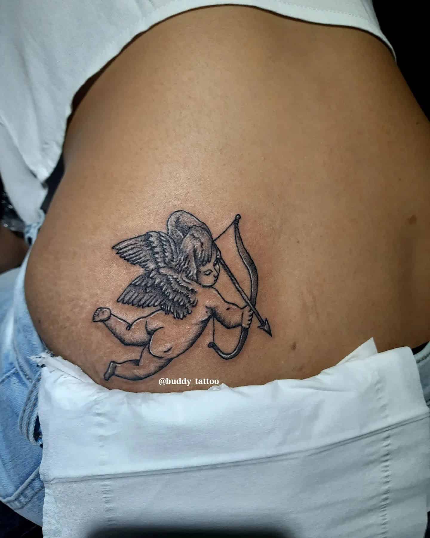 19] Baby Angel Arrow Lower Back Tattoo: Cherubic Archer