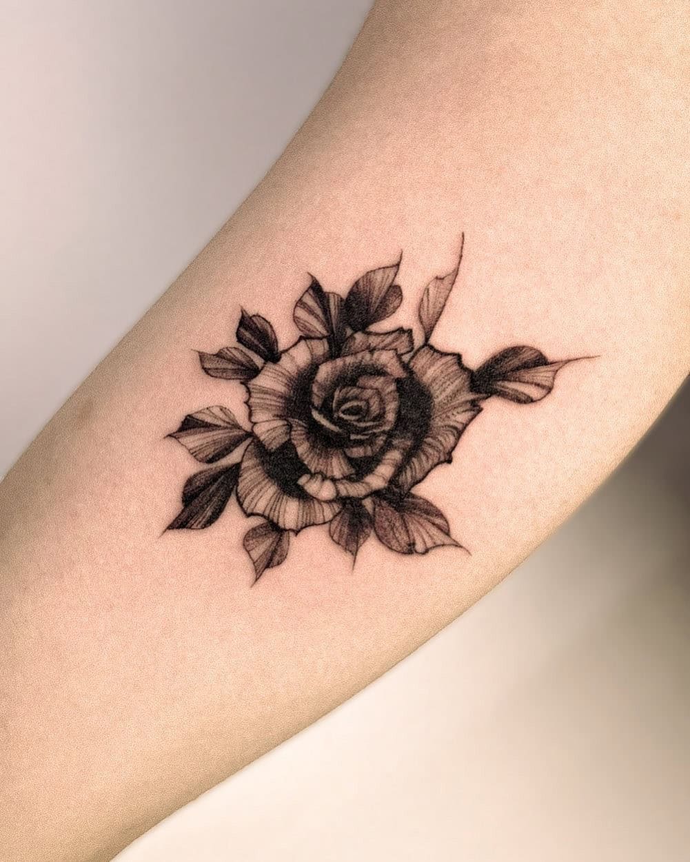 21] Black Rose Flower Tattoo on the Bicep: Timeless Grace