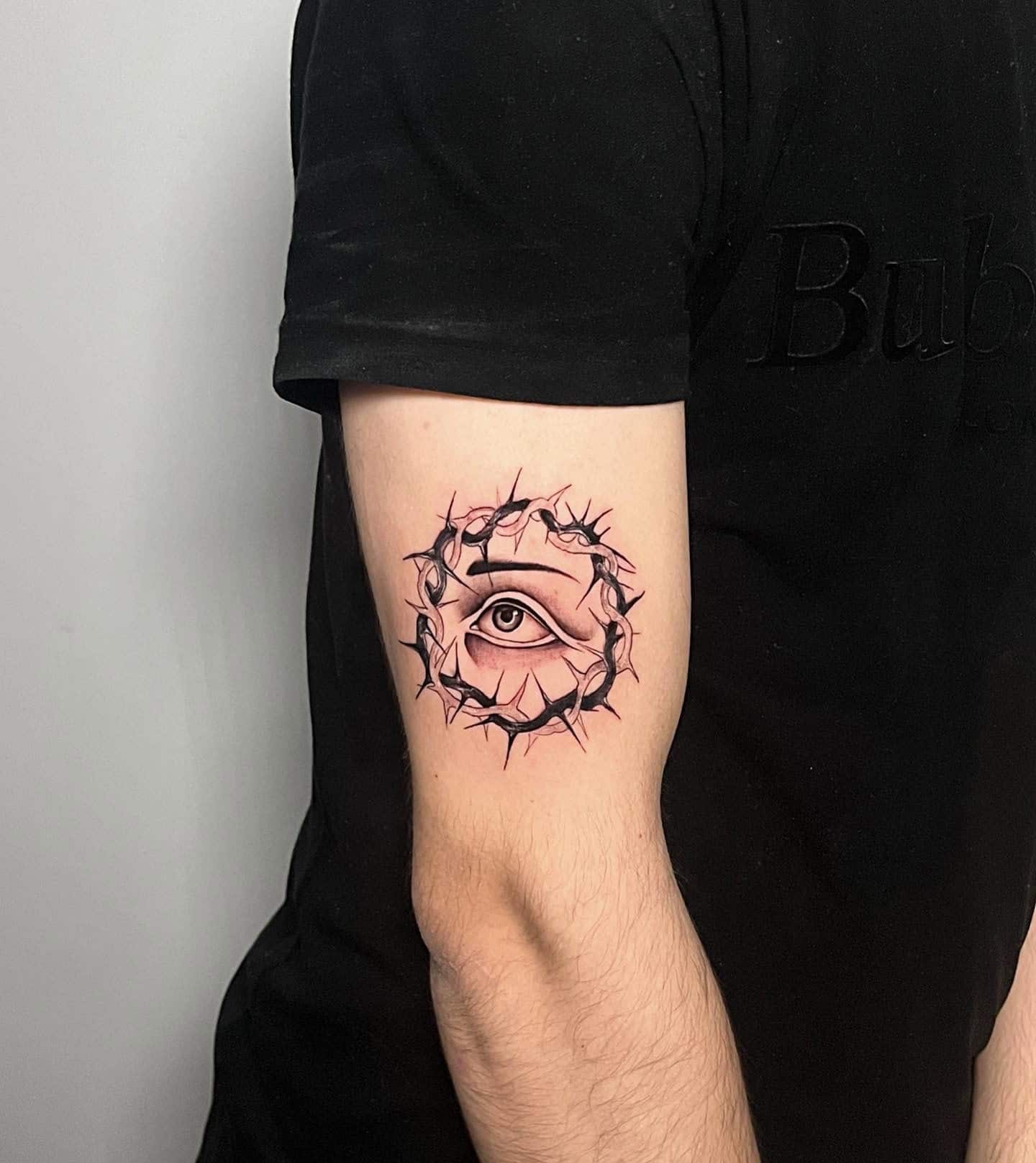 5] Eyeball Tattoo On Hand Surround With Thorns