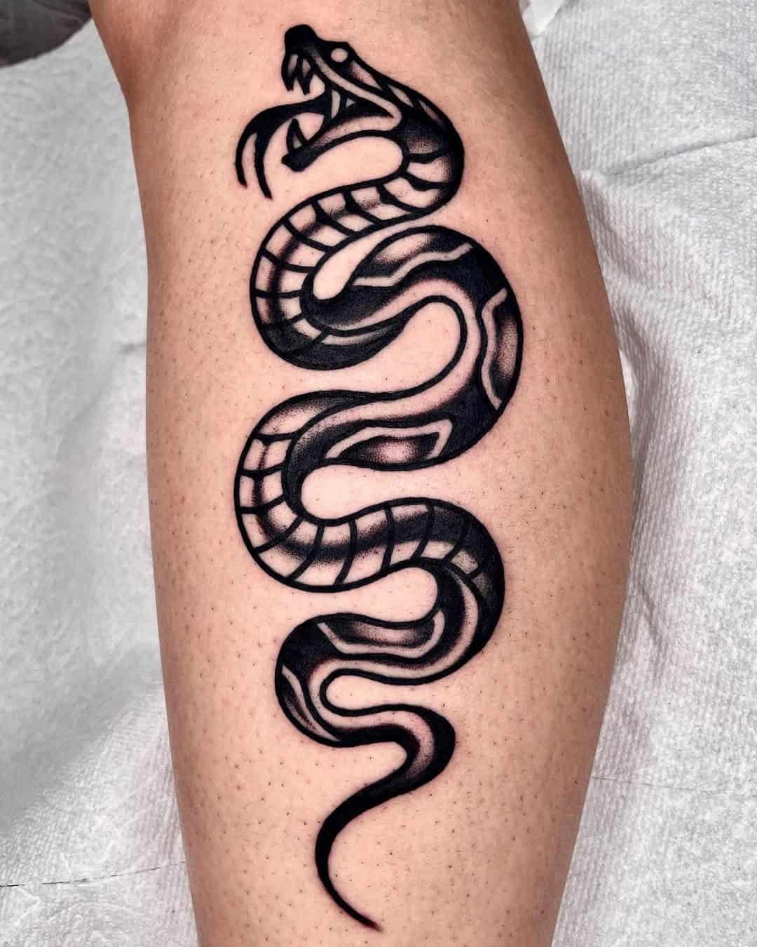 10] Lower Leg Calf Tattoo: Angry Snake