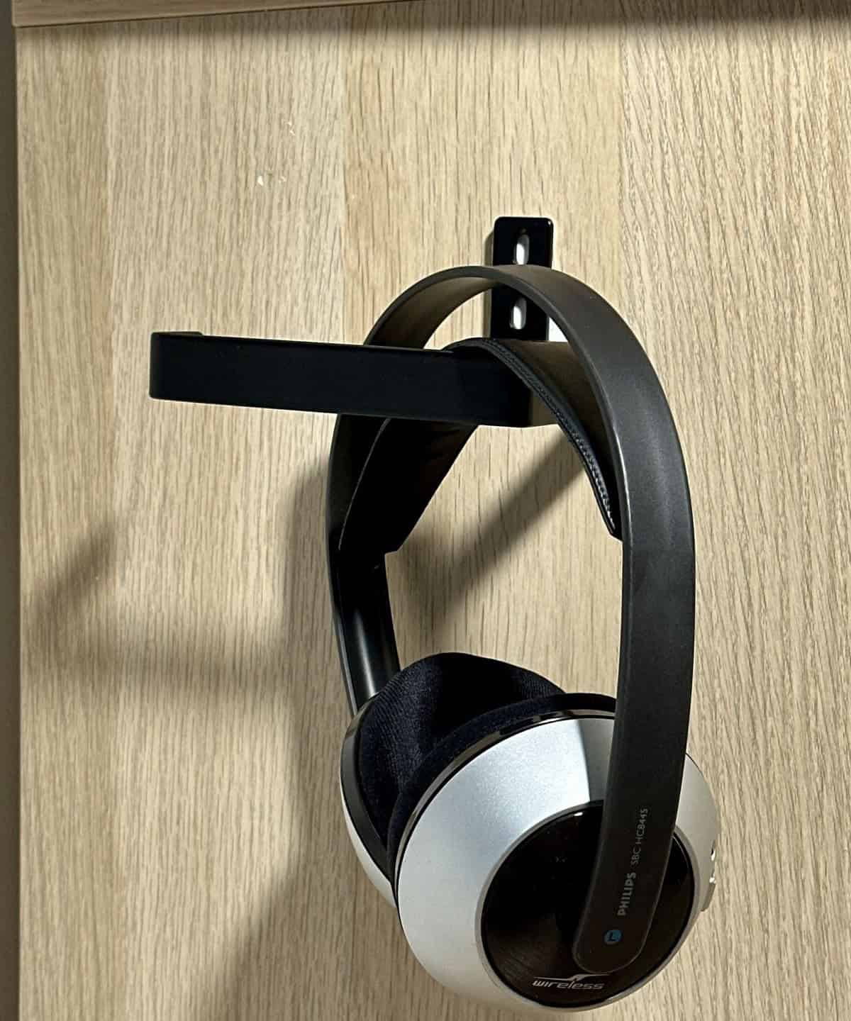 Use A Toilet Paper Roll Holder To Hang Your Headphones By The Desk