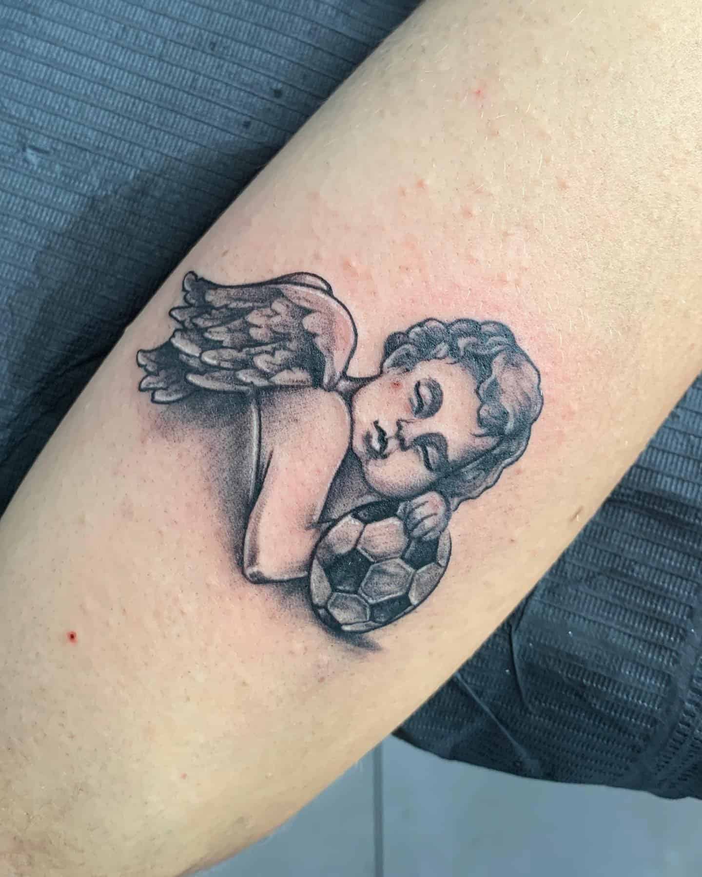 15] Sleeping Baby Angel Tattoo: Dreamy Slumber