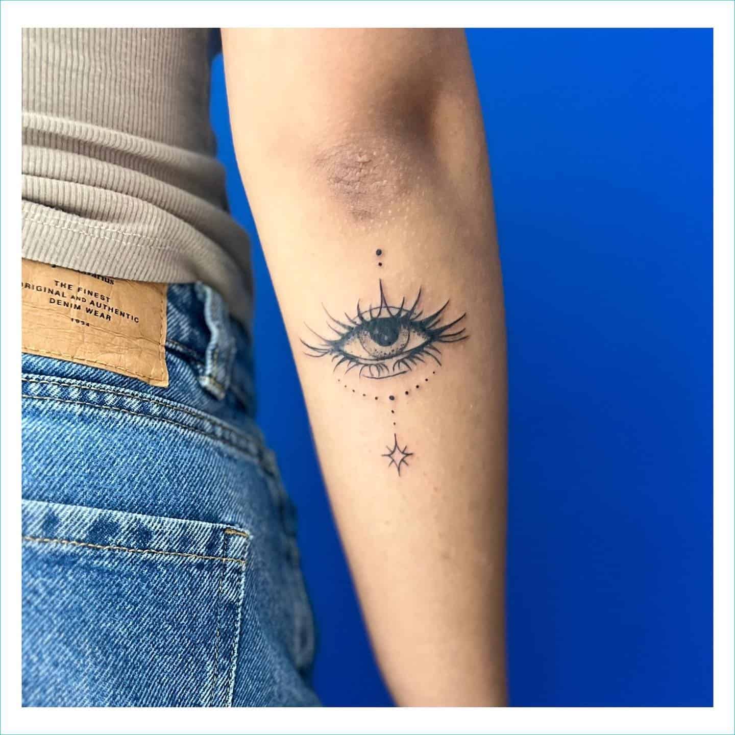 17] Cute Outer Arm Eye Tattoo: Delicate Choice