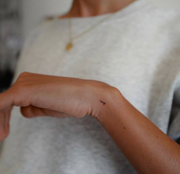 12] Tiny ‘i’ Letter Tattoo: Wrist Whispers