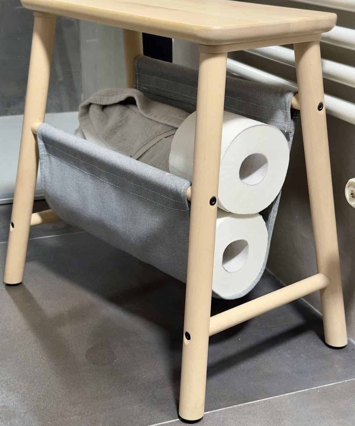 Use A Stool To Store Towels And Toilet Paper