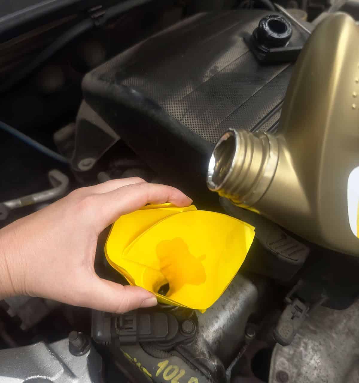 Make a Funnel with a Piece of Paper to Pour Out Oil Easily