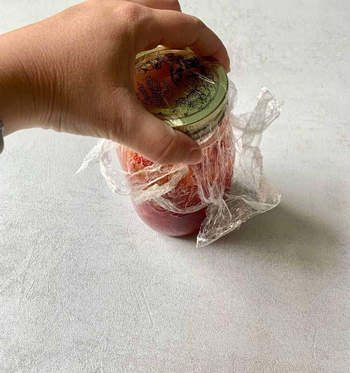 Get Extra Grip on Jars with Plastic Wrap