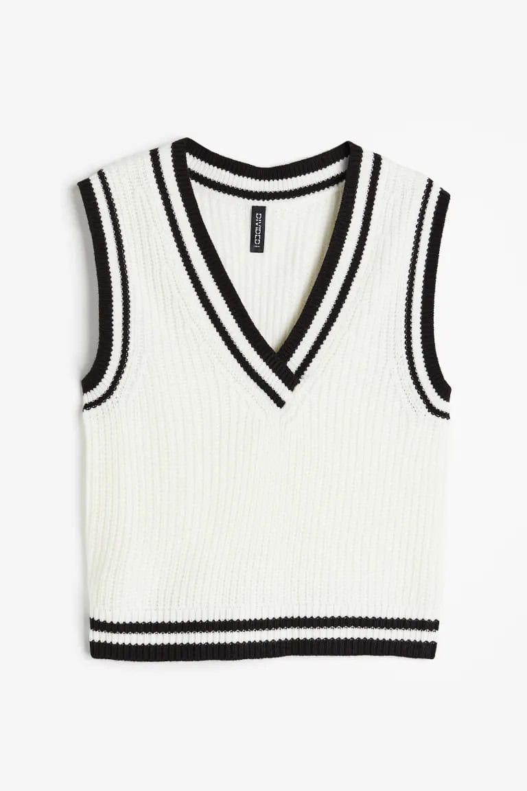 SLEEVELESS VEST