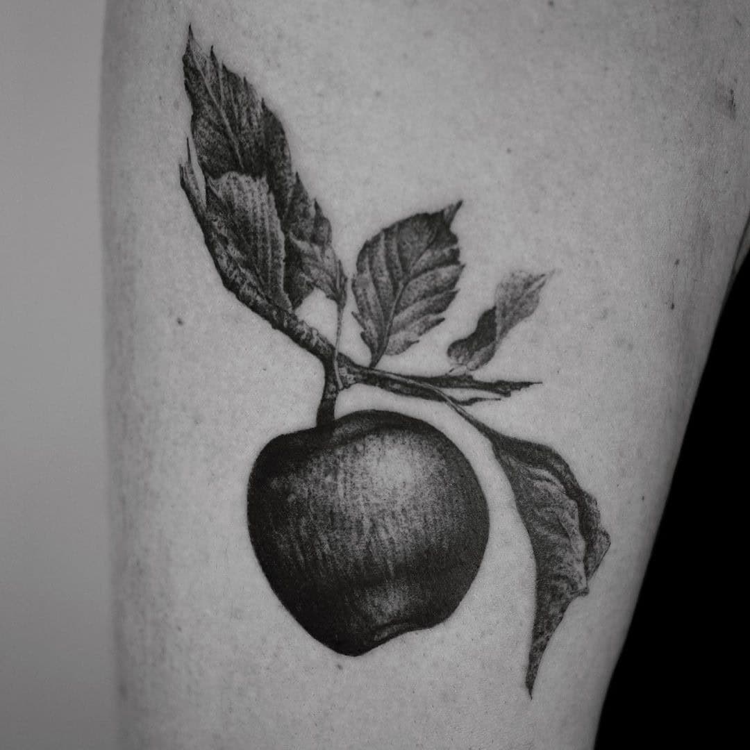 11] Elegant an Apple with Leaves tattoo: Thigh Ink