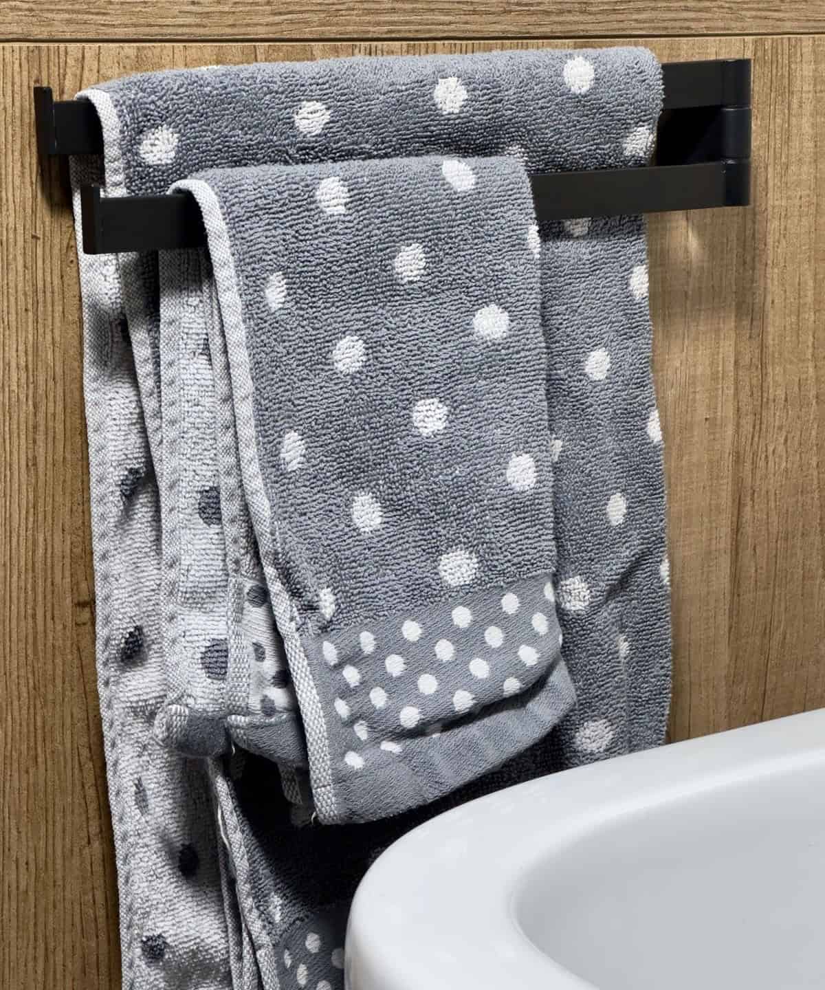 Hang A Towel Rack On The Bathroom Cabinet