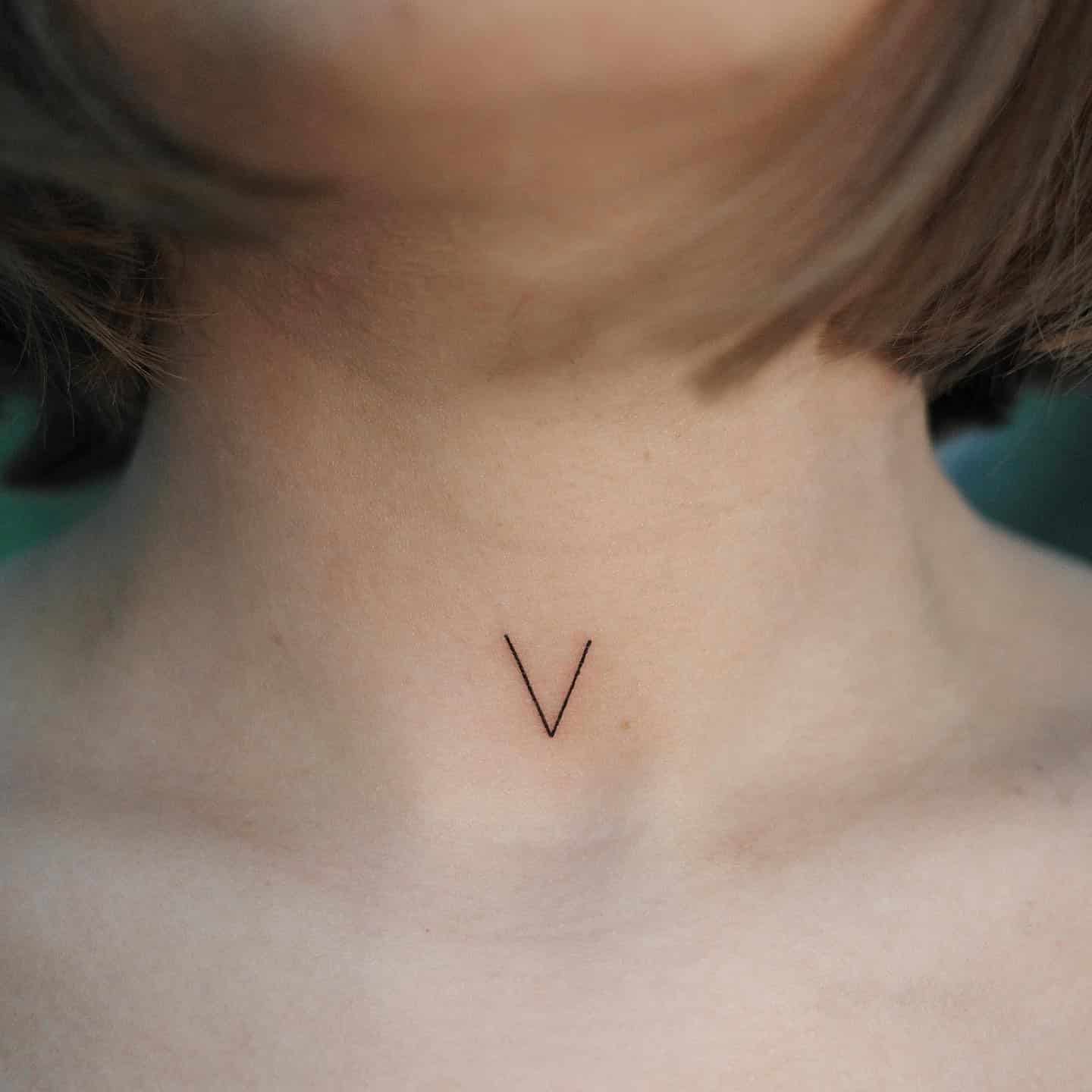 9] ‘V’ Neck Tattoo: Feminine Appeal