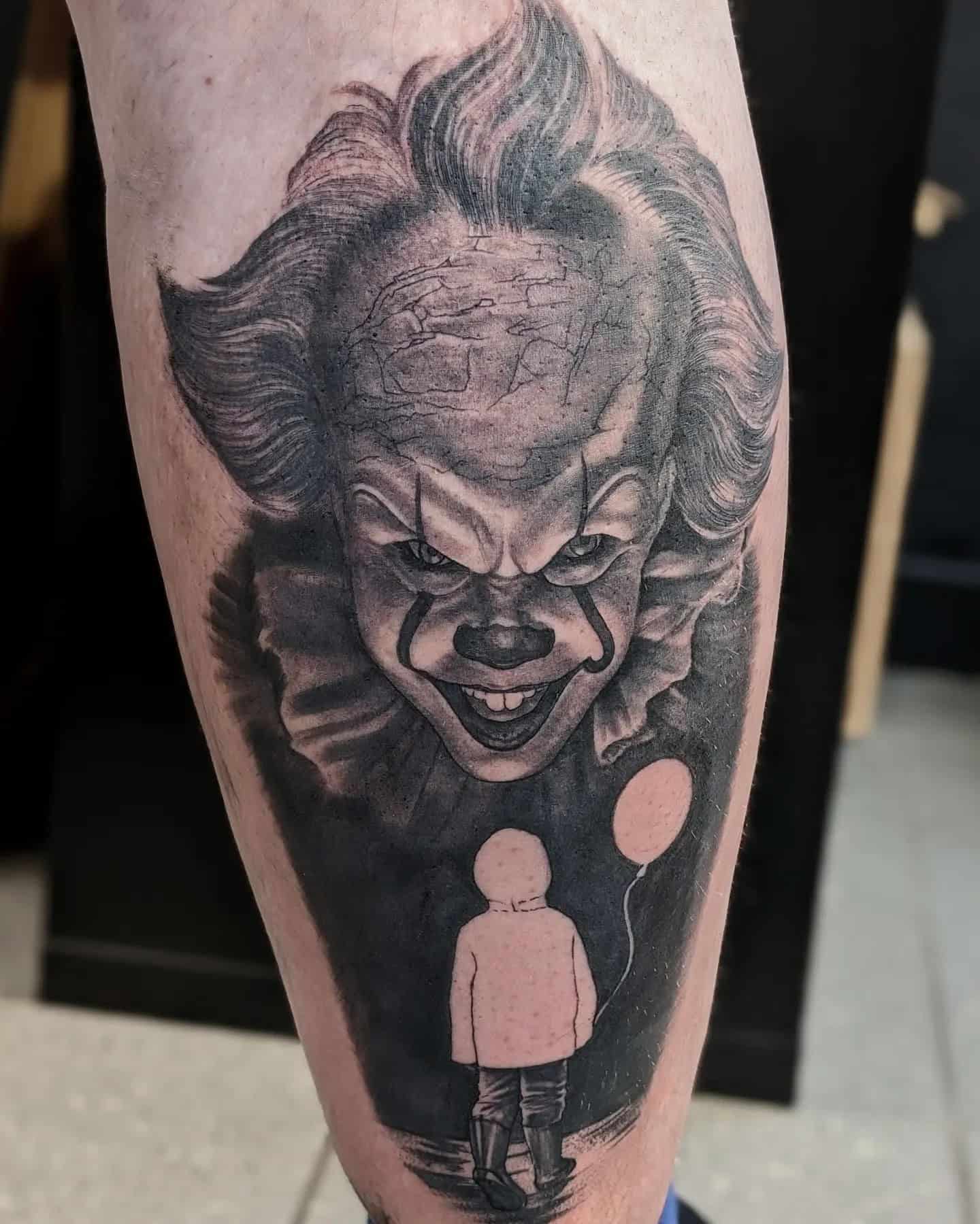 31] Pennywise Horror Fan Calf Tattoo: Pennywise Pursuit