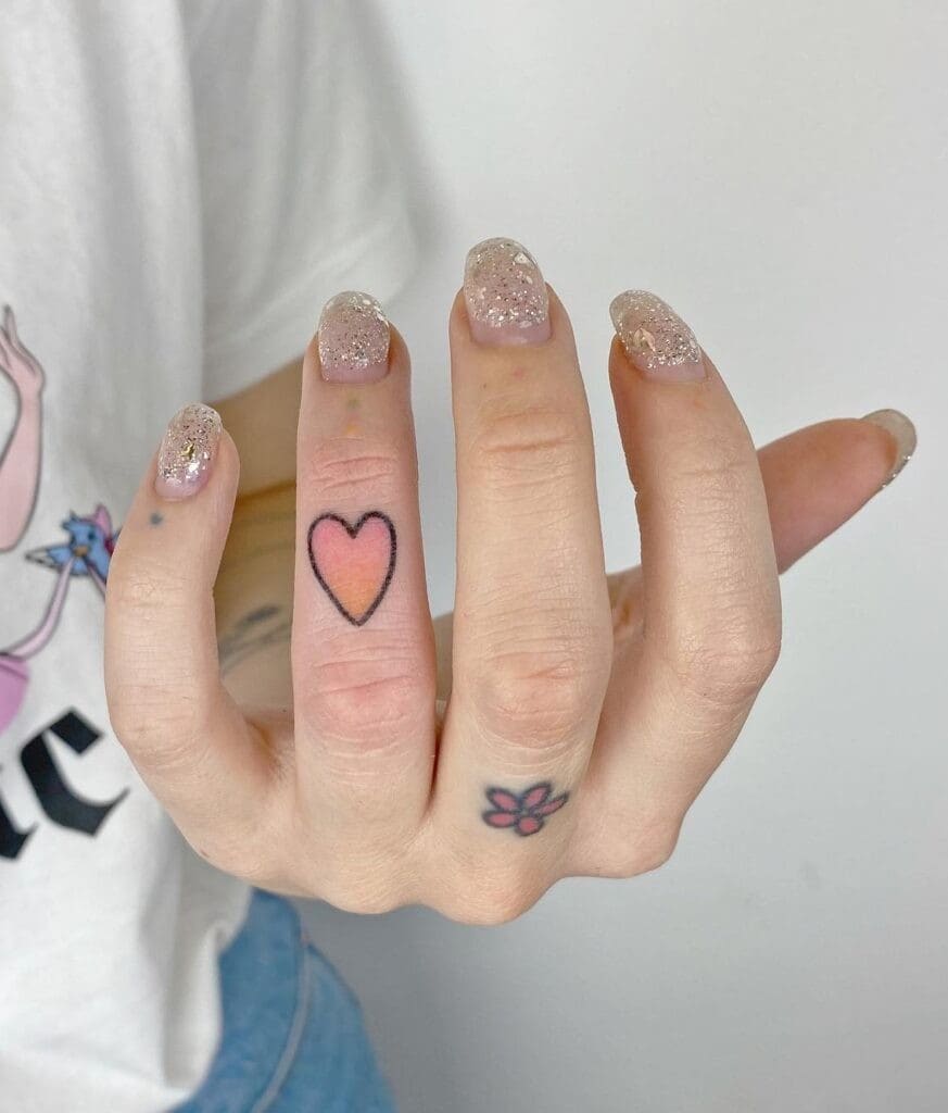 13] Love Heart Floral Tattoo Design on Ring Finger