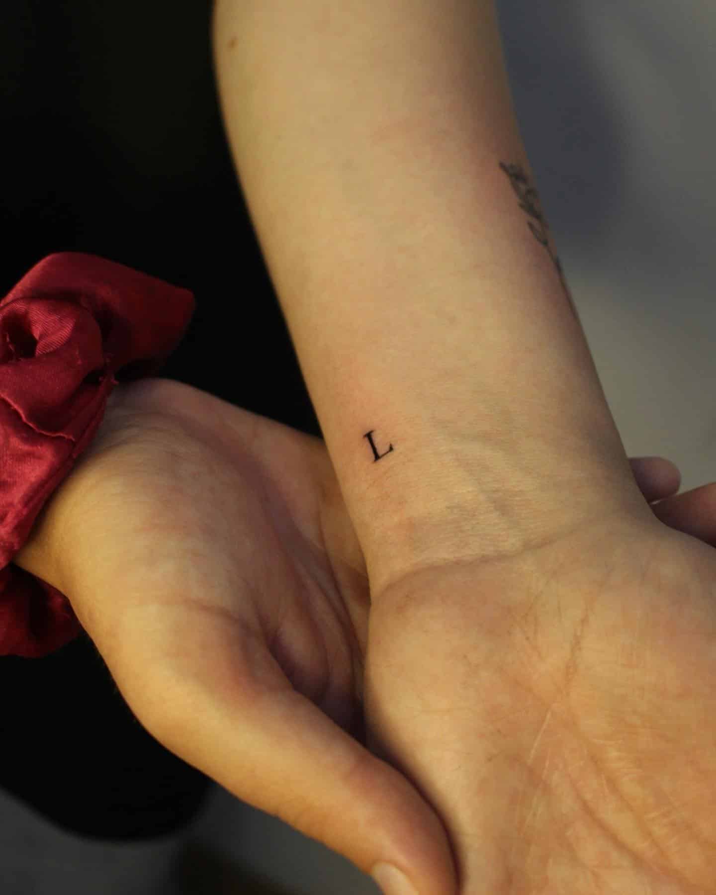 16] Minimal ‘L’ Letter Tattoo: Wrist Details