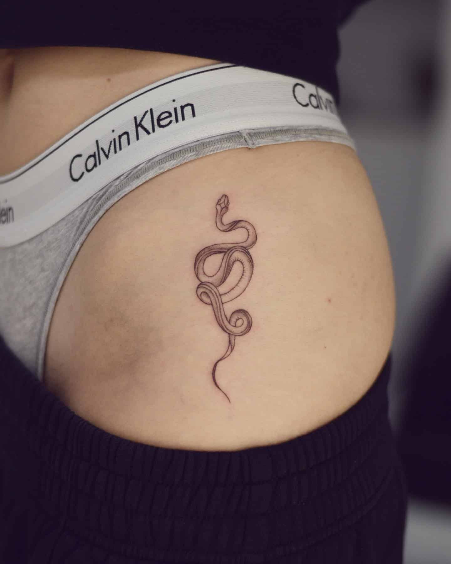 4] Hip Snake Tattoo: Serpentine Charm