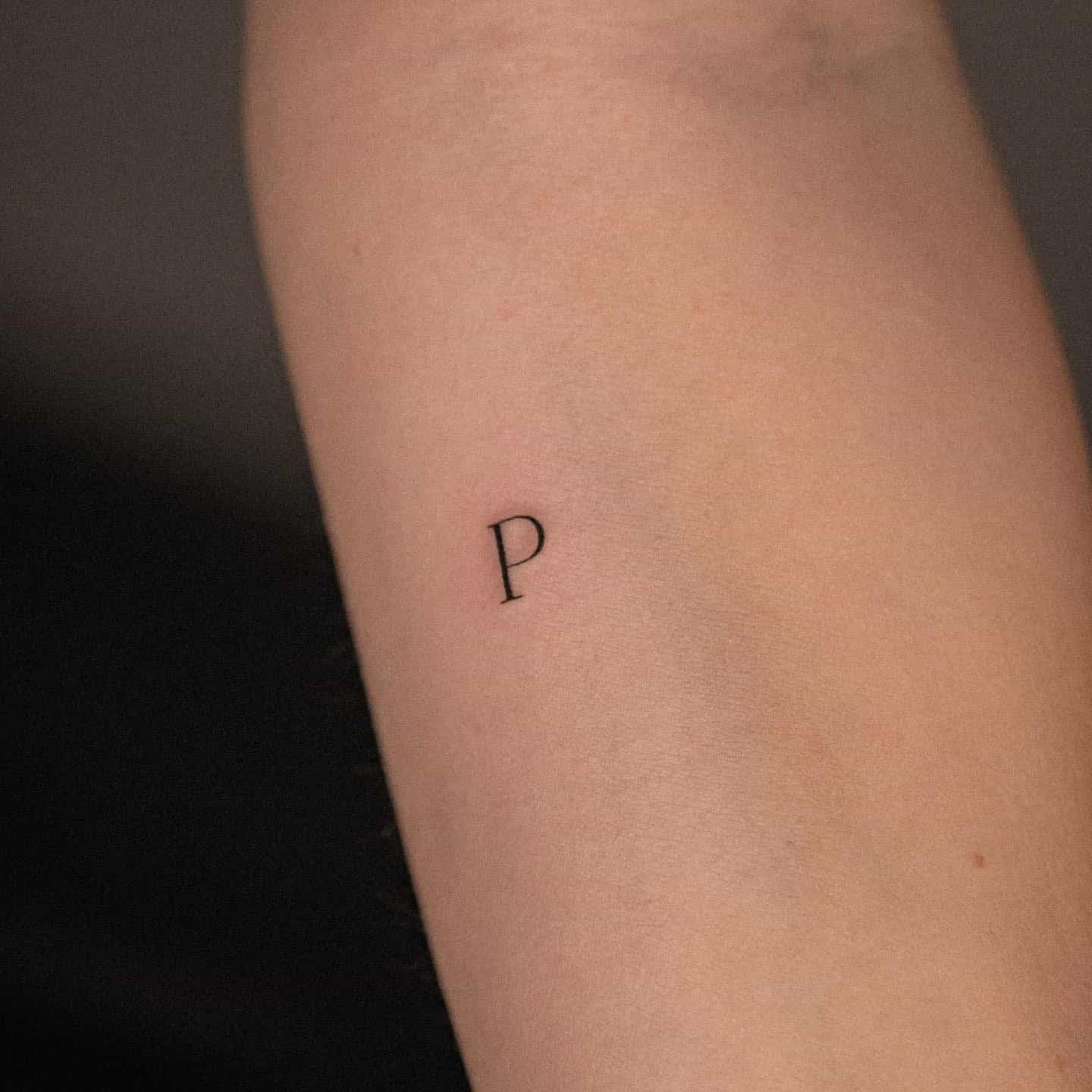 43] Subtle ‘P’ Letter Tattoo: Forearm Minimalism