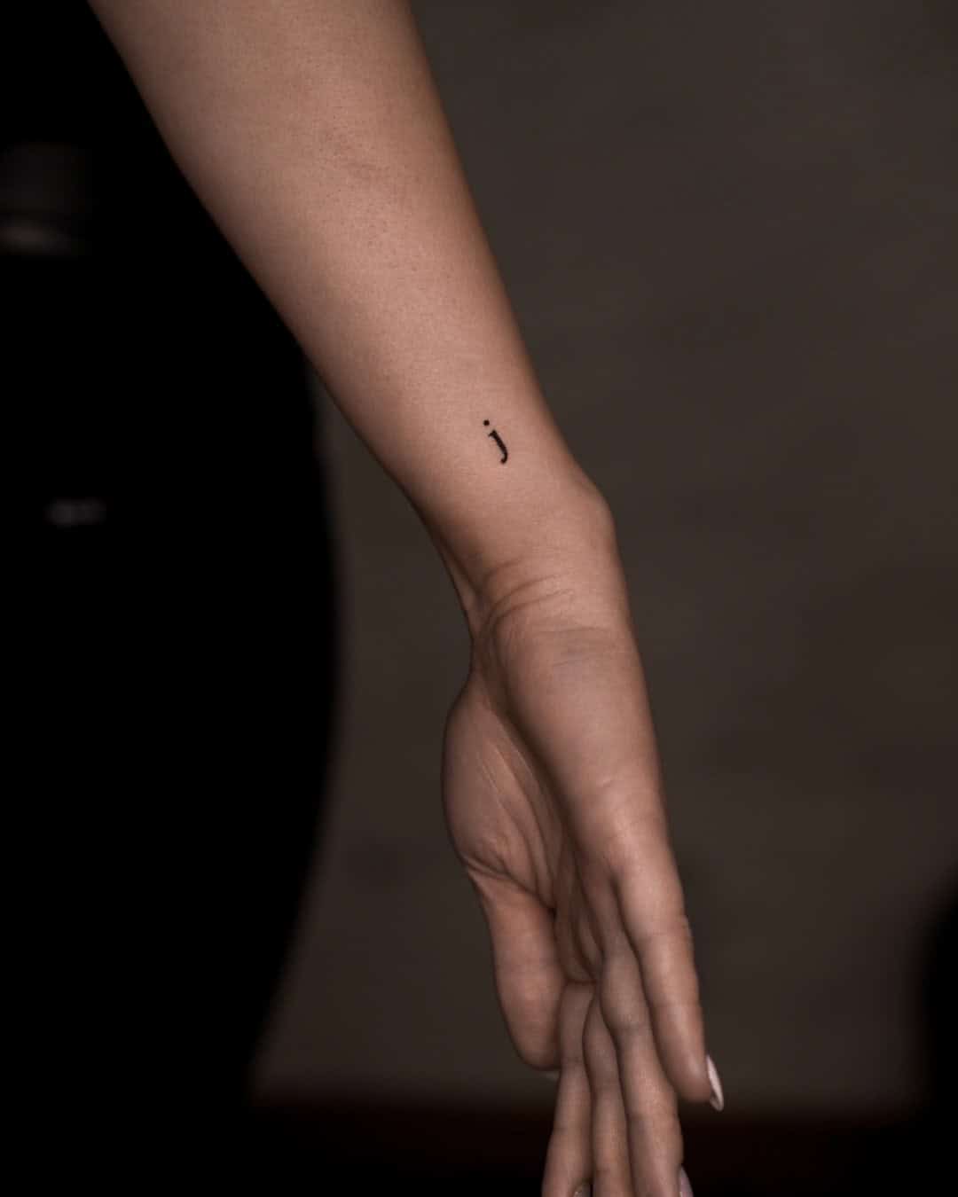 2] ‘J’ Wrist Tattoo: Subtle Detail, Dainty Accent