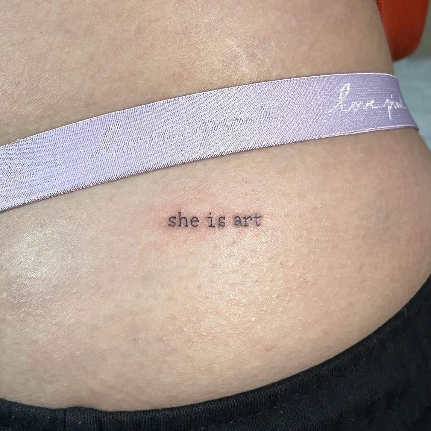 19] ‘She is Art’ Hip Tattoo: Artistry Unveiled