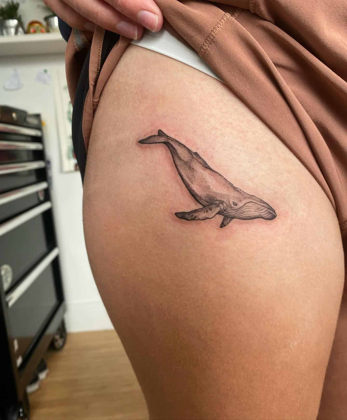 51] Whale Hip Tattoo: Oceanic Majesty